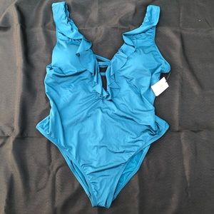 One piece swimsuit, never worn, brand new